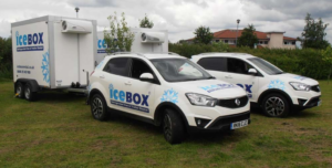 two-icebox-trailers-and-cars